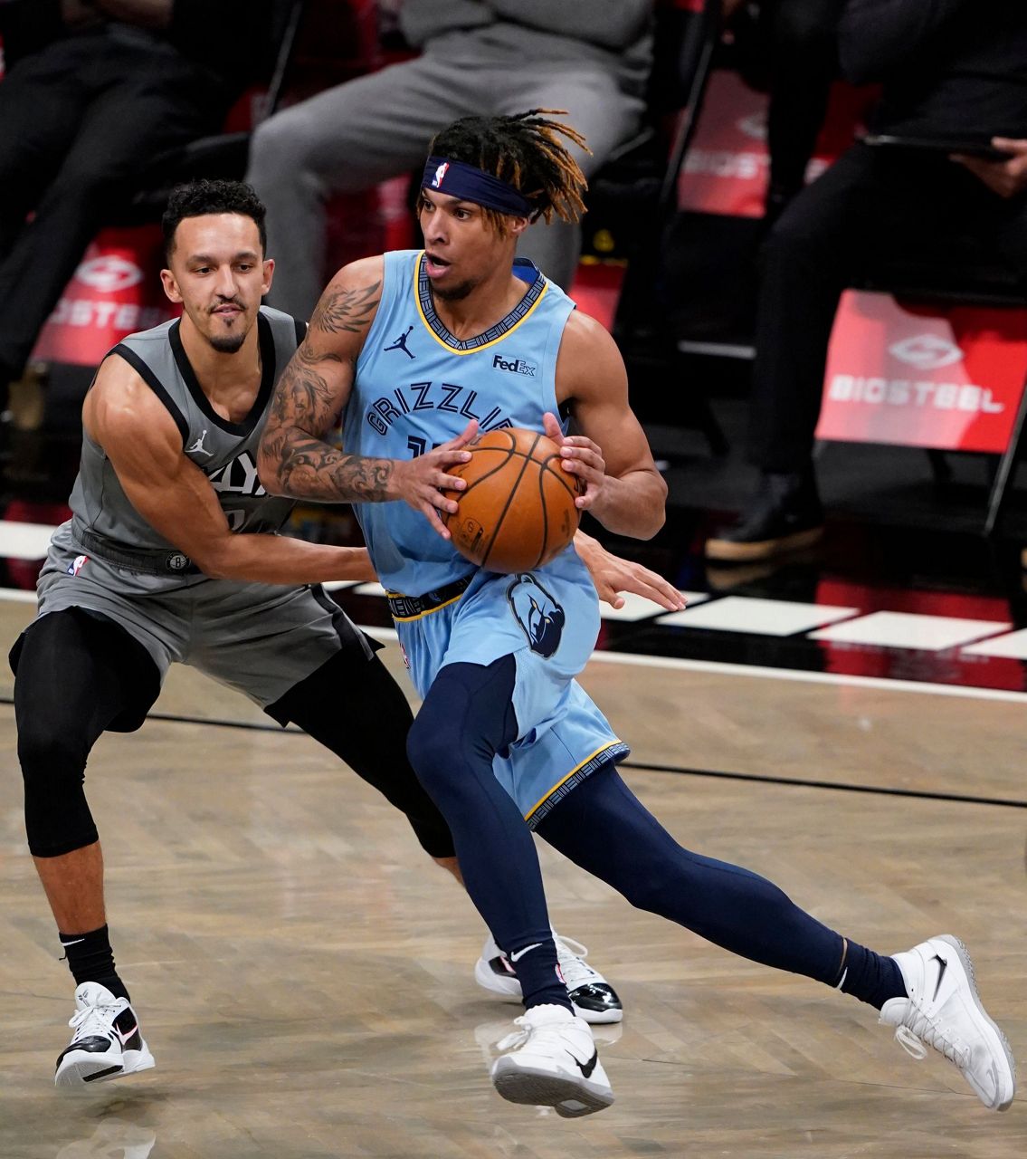Grizzlies lose Morant to ankle injury, beat Nets in overtime
