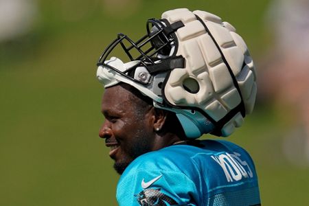 EXPLAINER: NFL using helmet caps for player safety, research