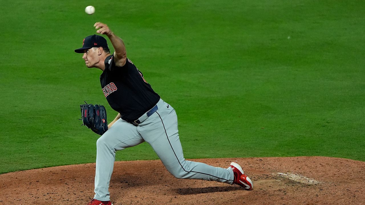 Cleveland Guardians relief pitcher Erik Sabrowski throws during the seventh inning of a baseball game against the Kansas City Royals Wednesday, Sept. 4, 2024, in Kansas City, Mo. (AP Photo/Charlie Riedel)