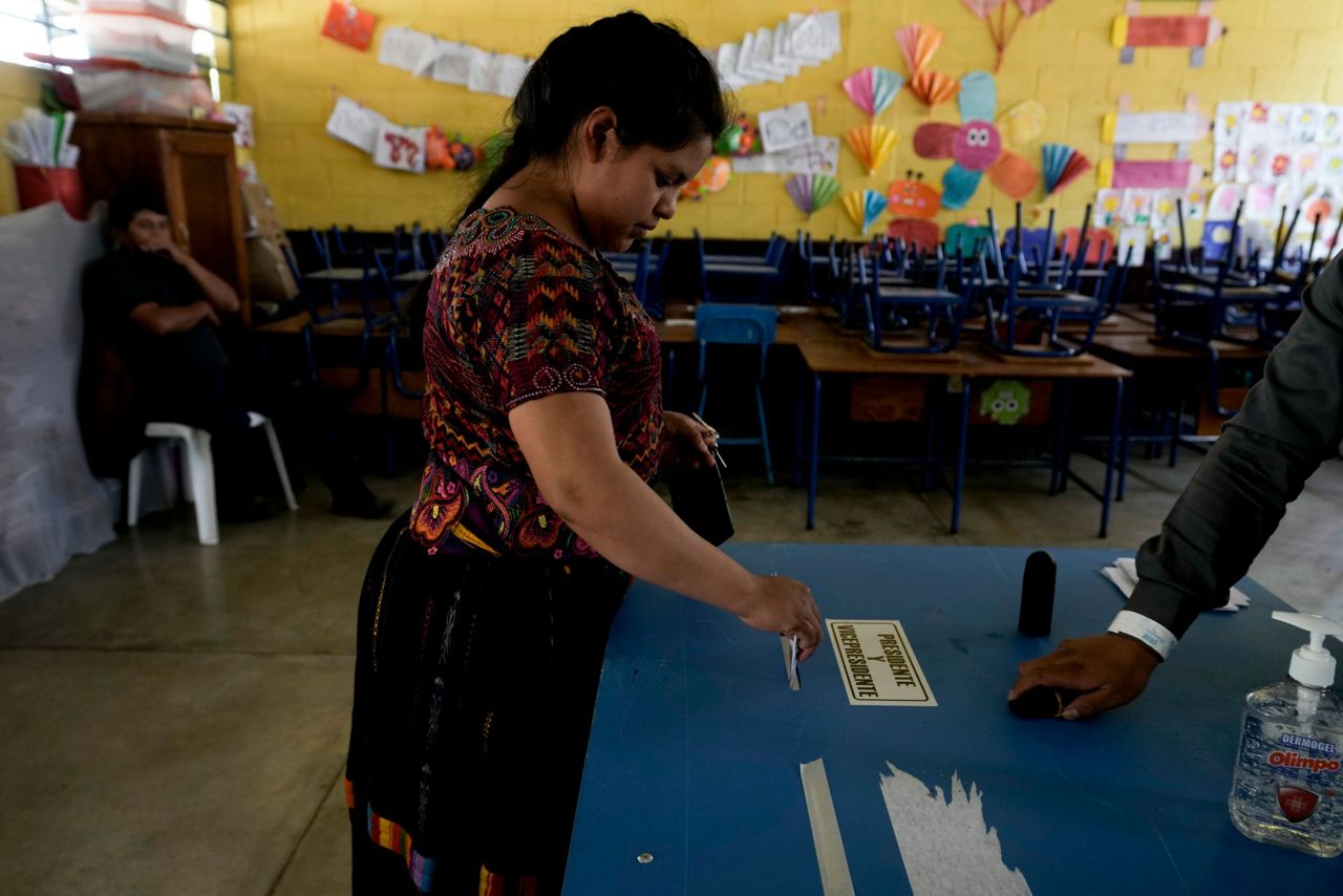 Guatemalans head to the polls, hoping their new leader will bring real