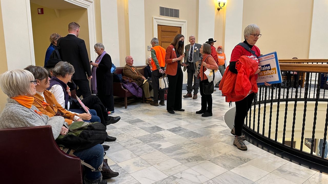 Members of the Maine Gun Safety Coalition gather in the State House before a hearing to create a new extreme risk protection order system. (Spectrum News/Susan Cover)