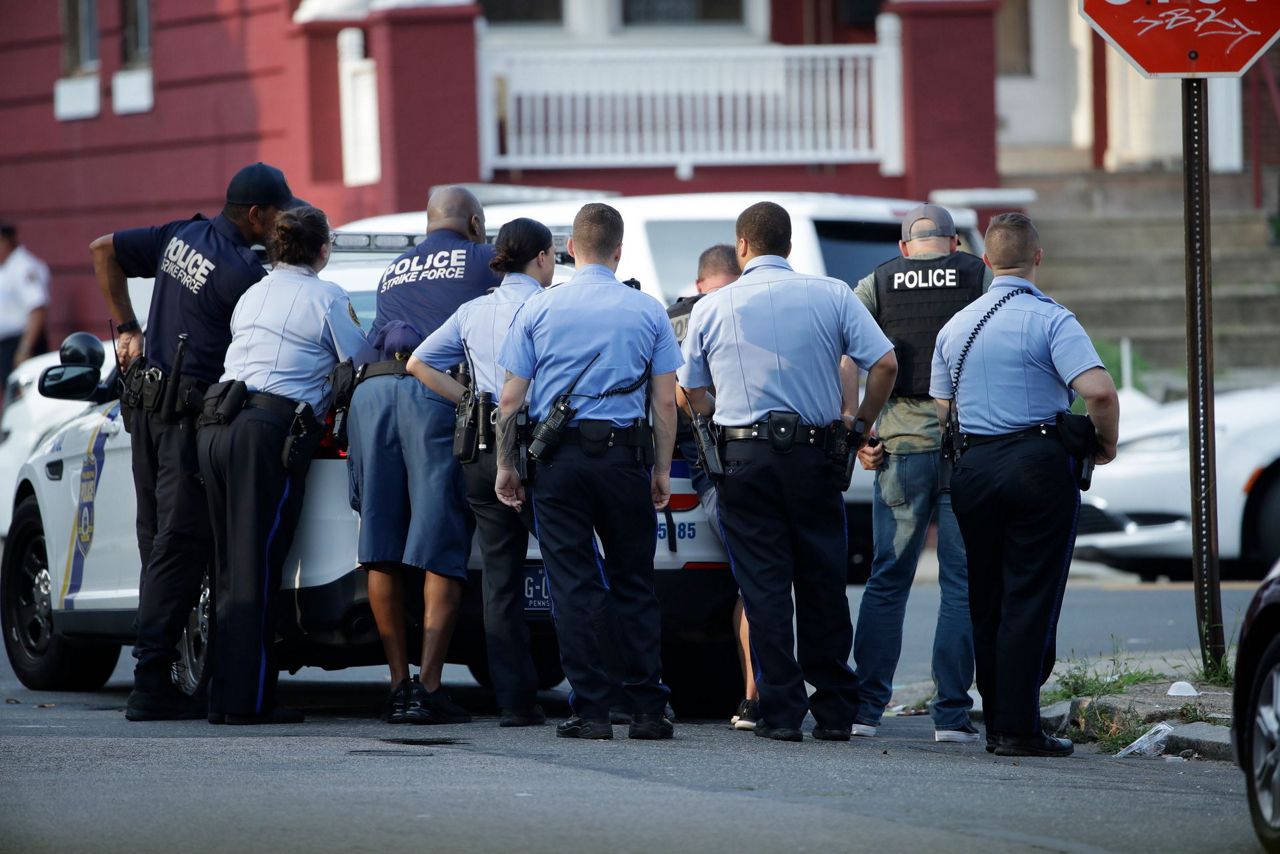 Police: Gunman shooting at police officers in Philadelphia