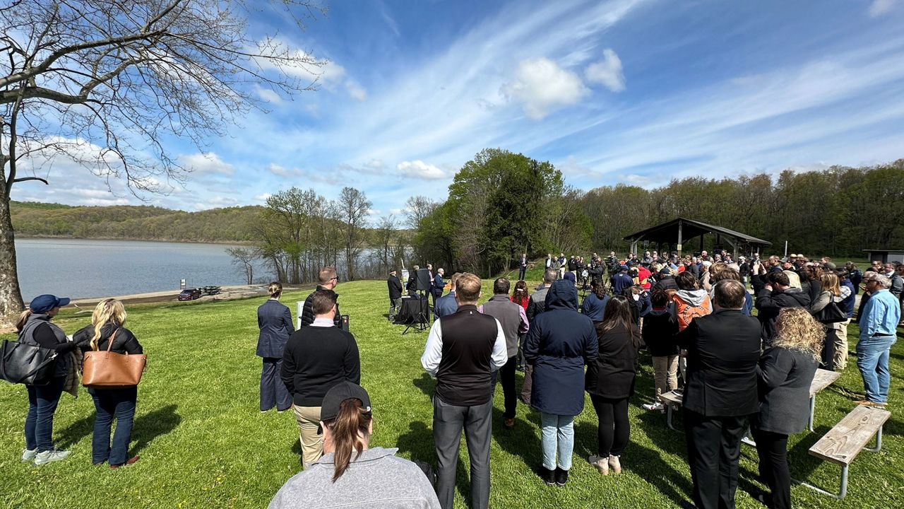 People gather along the Licking River as Gov. Mike DeWine, Ohio Lt. Governor Jon Husted, ODNR and Intel announce the new H2Ohio partnership. (Photo courtesy of the Ohio Department of Natural Resources)