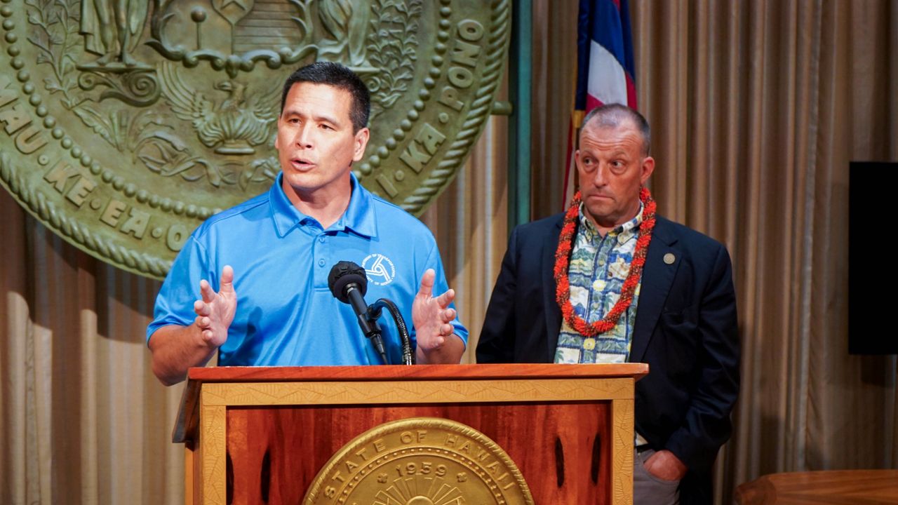 HDOT Director Ed Sniffen and Gov. Josh Green speak at the press conference announcing the new 50-year lease for Kawaihapai Airfield. (Courtesy Office of Gov. Josh Green)