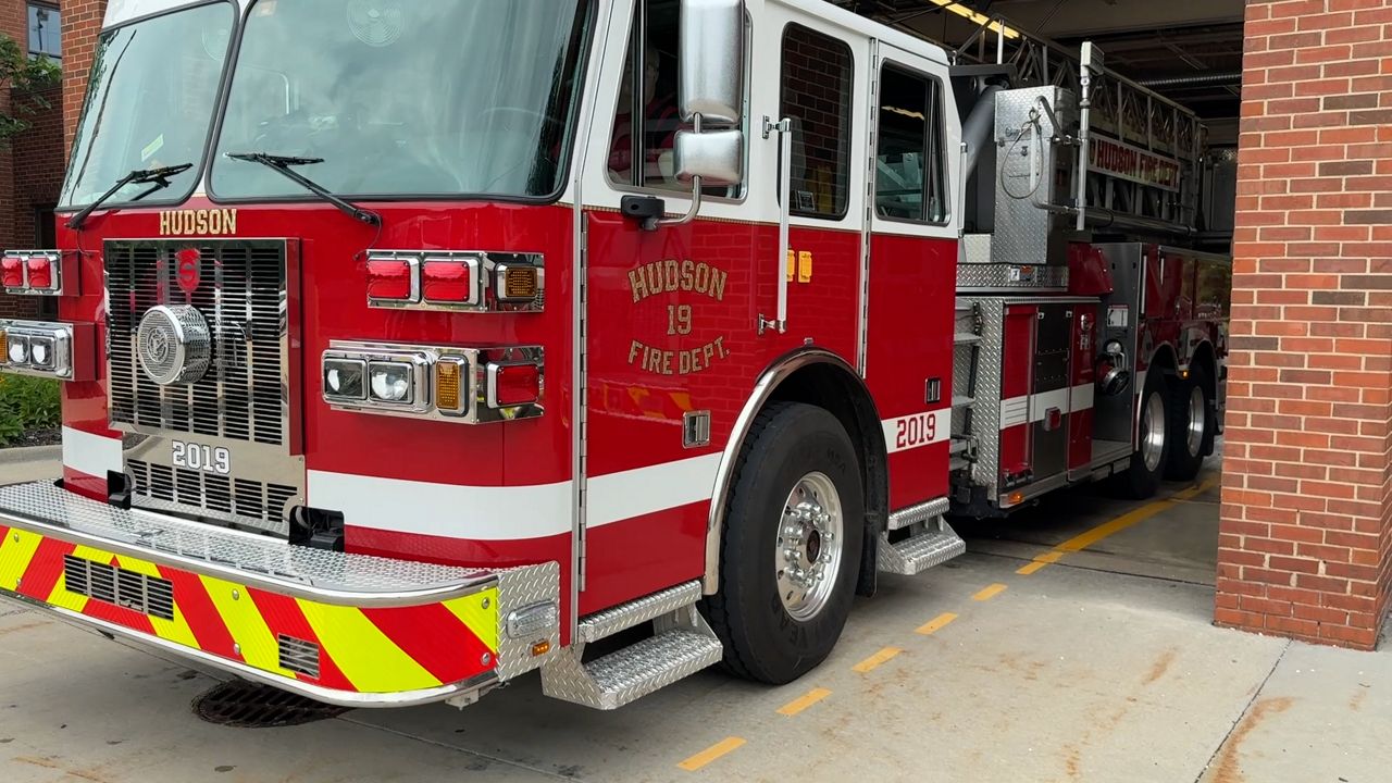 A Hudson fire truck pulls out of the Hudson fire station 
