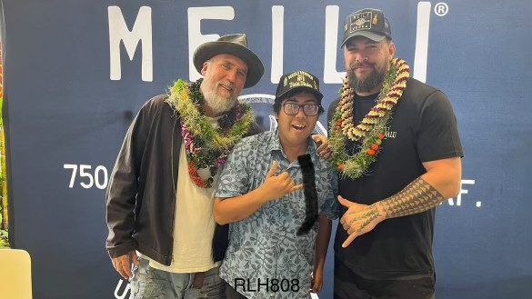 Matthew Tabios of Makakilo, waited 11 hours to meet one of his top Hawaii-born celebrities, Jason Momoa, at Foodland Farms on Dec. 20, 2023. Momoa co-founded Meili vodka with Blaine Halverson (far left); the pair are launching the vodka brand in Hawaii this week. (Courtesy Matthew Tabios)