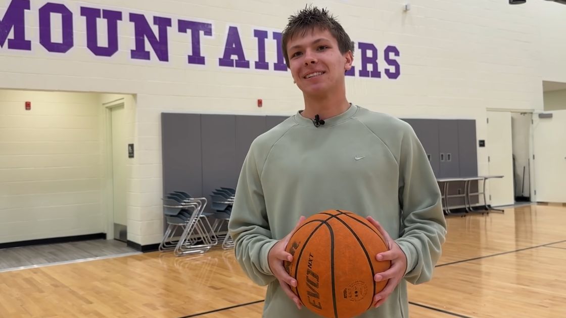 Graduate leads the way in the classroom and on the basketball court