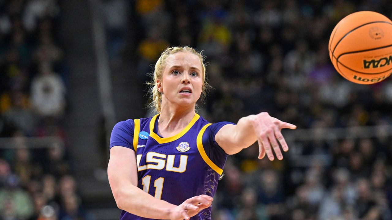 LSU guard Hailey Van Lith passes the ball during the first half of a Elite Eight college basketball game against Iowa in the NCAA Tournament, April 1, 2024, in Albany, N.Y. (AP Photo/Hans Pennink, file)