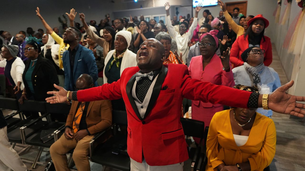 Jean-Michel Gisnel cries out while praying with other congregants at the First Haitian Evangelical Church of Springfield, Sunday, January 26, 2025, in Springfield, Ohio.