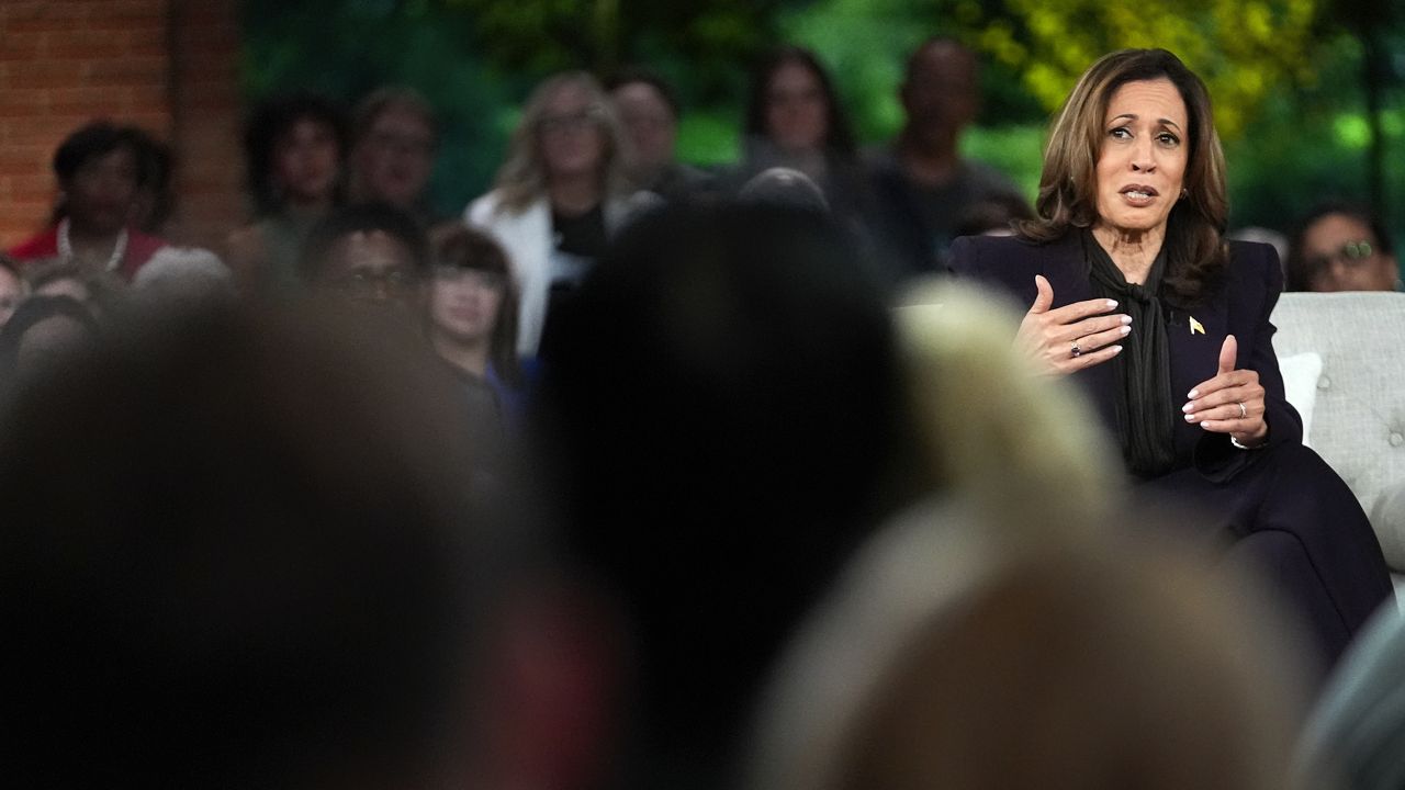 Democratic presidential nominee Vice President Kamala Harris joins Oprah Winfrey at Oprah's Unite for America Live Streaming event, where she spoke to the family of Amber Thurman on Thursday, Sept. 19, 2024 in Farmington Hills, Mich. (AP Photo/Paul Sancya)