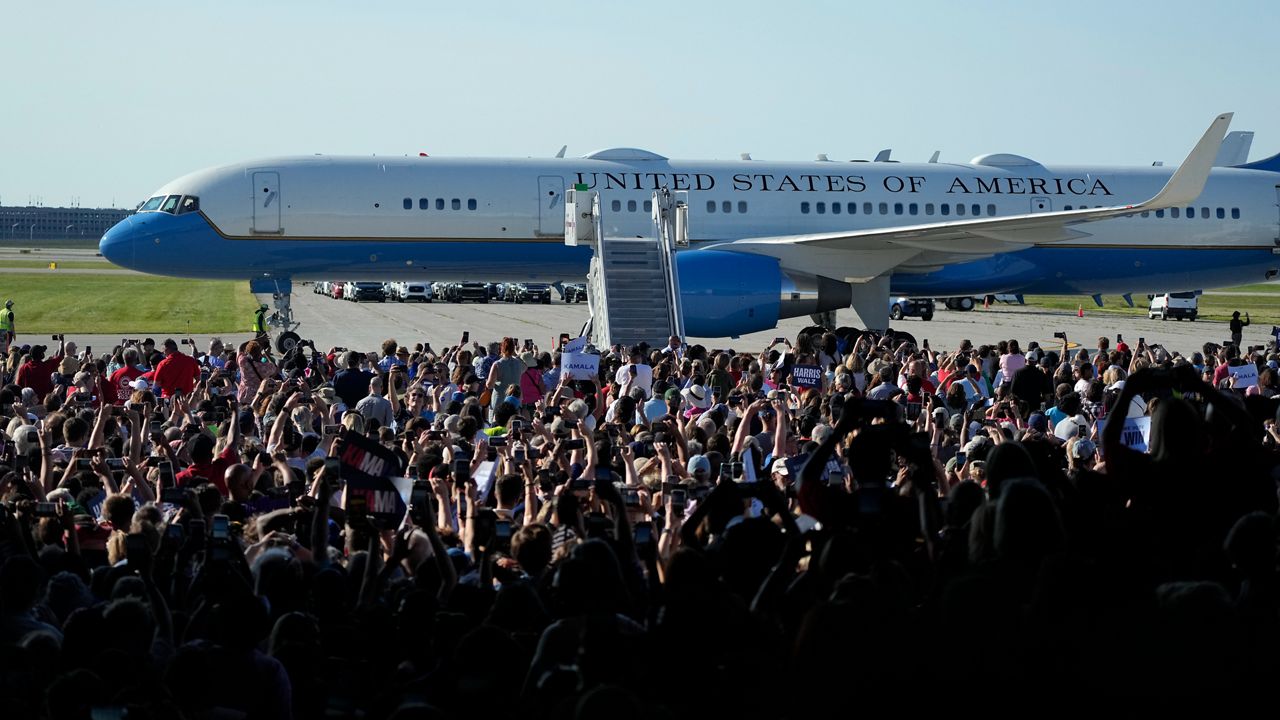 Air Force Two with Democratic presidential nominee Vice President Kamala Harris and her running mate Minnesota Gov. Tim Walz aboard arrive for a campaign rally Wednesday, Aug. 7, 2024, in Romulus, Mich. (AP Photo/Carlos Osorio)