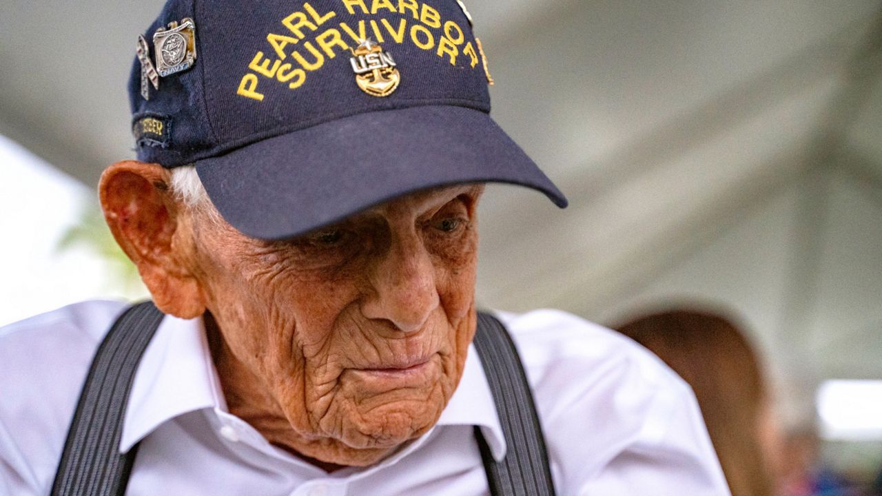Pearl Harbor survivor Harry Chandler, 102, of Tequesta, Fla., speaks to the media during the 82nd Pearl Harbor Remembrance Day ceremony on Dec. 7, 2023, at Pearl Harbor in Honolulu. (AP Photo/Mengshin Lin, File)