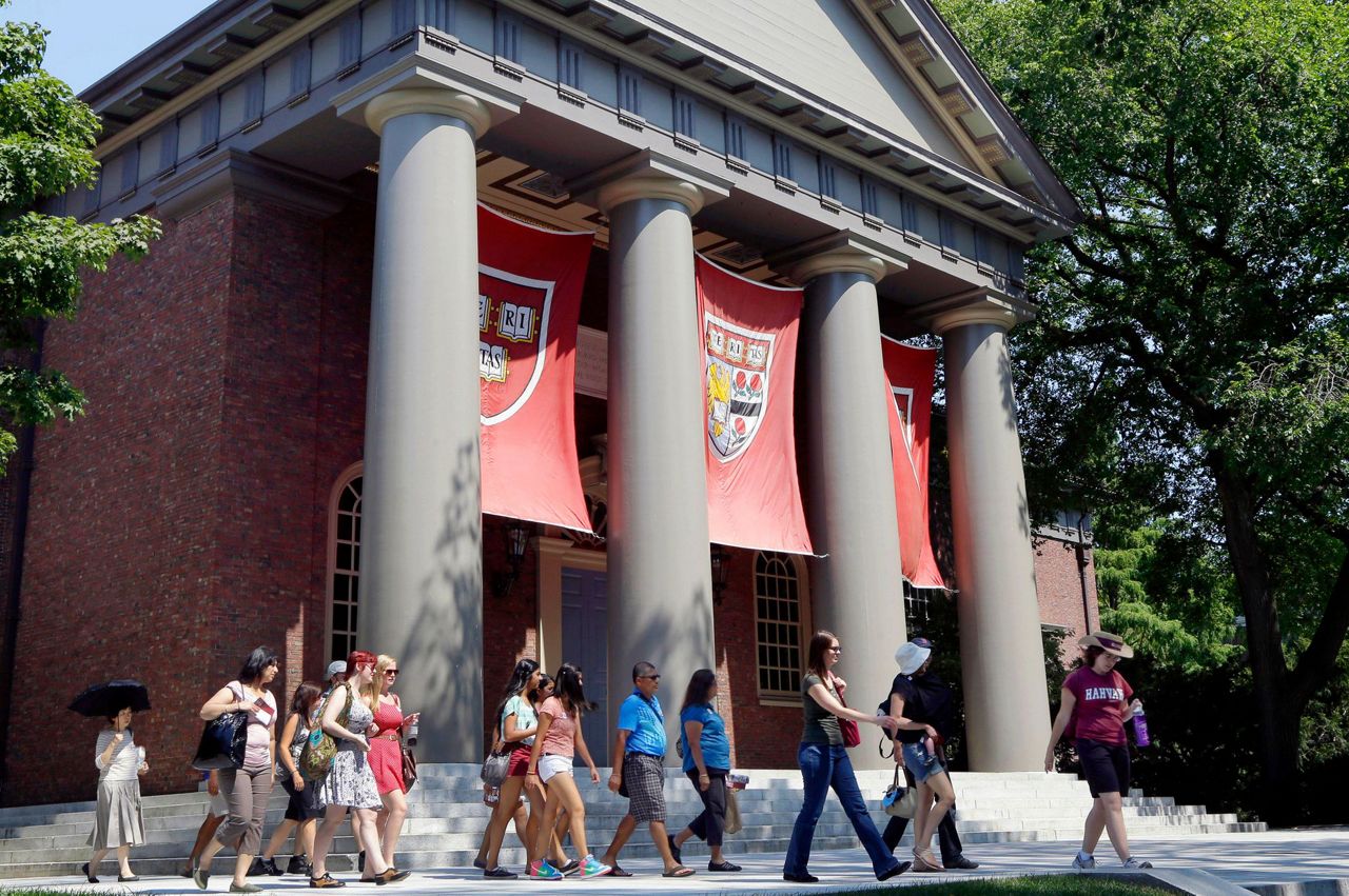 Woman suing Harvard over slave portraits gets key support