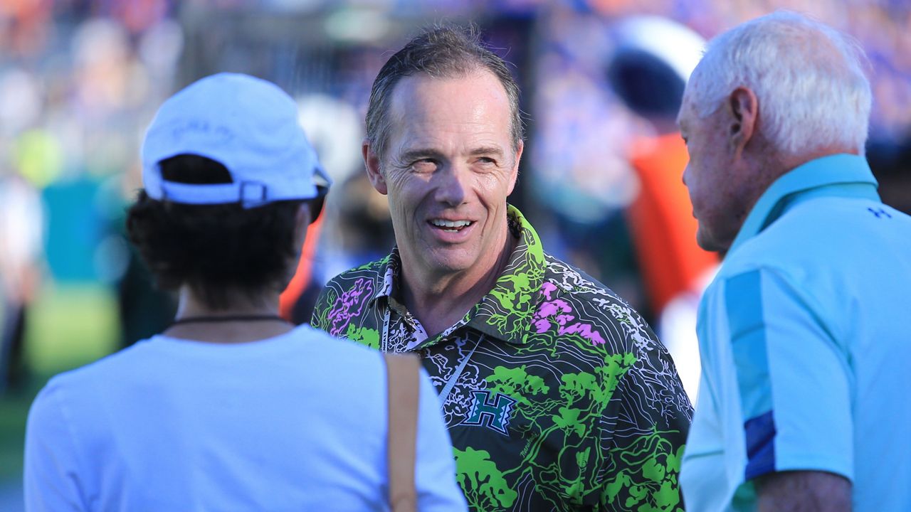 University of Hawaii Athletic Director Craig Angelos, middle, seen at the UH-Boise State football game at the Clarence T.C. Ching Athletics Complex on Saturday. Angelos was a proponent of UH moving most of its sports into the Mountain West Conference, which happened on Monday.