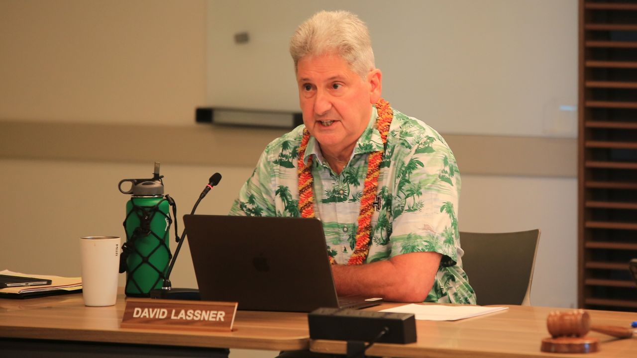 University Hawaii President David Lassner, speaking at a Board of Regents meeting at UH's Bachman Hall on Thursday morning, defended his decision to dismiss UH Athletic Director Craig Angelos on Tuesday.