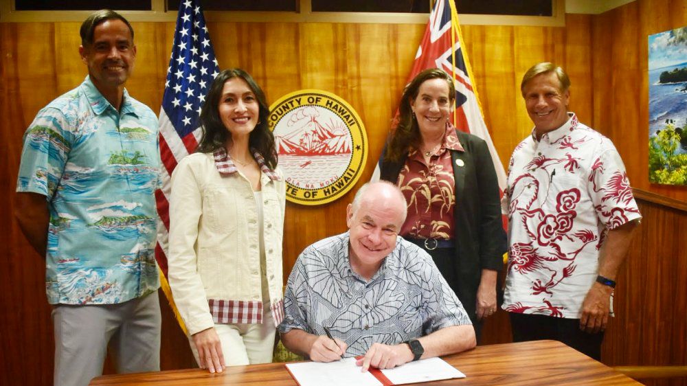 Signing Bill 123, pictured left to right, Hawaii County Planning Director Zendo Kern, Councilwoman Ashley Kierkiewicz, Mayor Mitch Roth, Council Chair Heather Kimball, Deputy Director Jeff Darrow. (Photo courtesy of the Office of the Mayor)