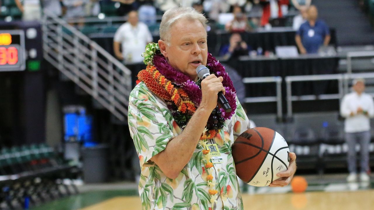 Longtime ESPN Honolulu play-by-play broadcaster Bobby Curran spoke to the crowd at the Stan Sheriff Center during the final game call of his career, Hawaii men's basketball against Cal State Bakersfield on March 9, 2024.