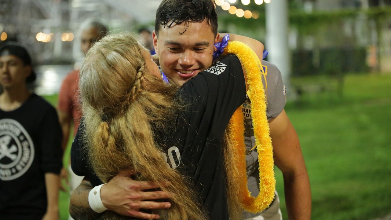 San Jose State quarterback Chevan Cordeiro hugged family members after the Spartans lost 24-14 to Coastal Carolina in the EasyPost Hawaii Bowl, the final game of his six-year college career that began at Hawaii.