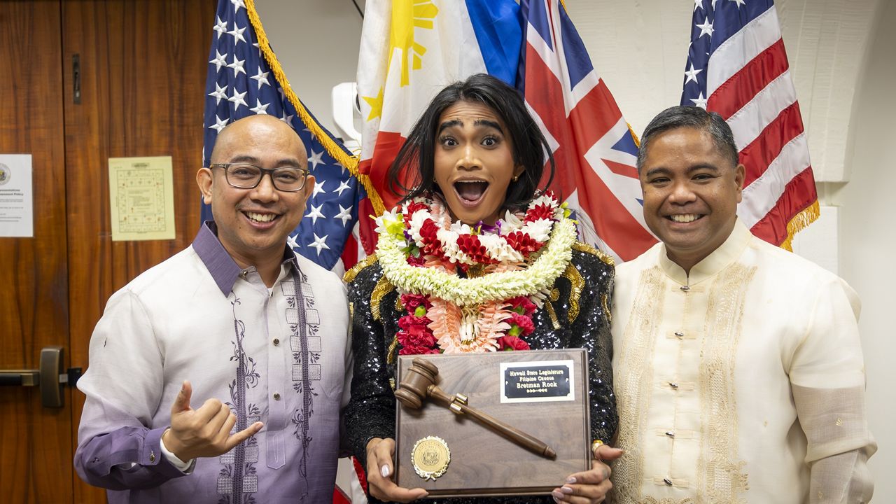 Bretman Rock poses with members of the Hawaii State Legislature Filipino Caucus. (Photo courtesy of the Hawaii House of Representatives)
