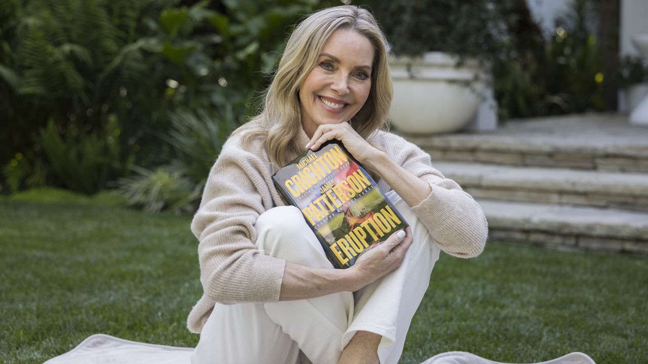 Sherri Crichton poses for a portrait on Tuesday, May 21, 2024, in Los Angeles to promote "Eruption," a book by her late husband Michael Crichton, co-authored by James Patterson. (Photo by Willy Sanjuan/Invision/AP)