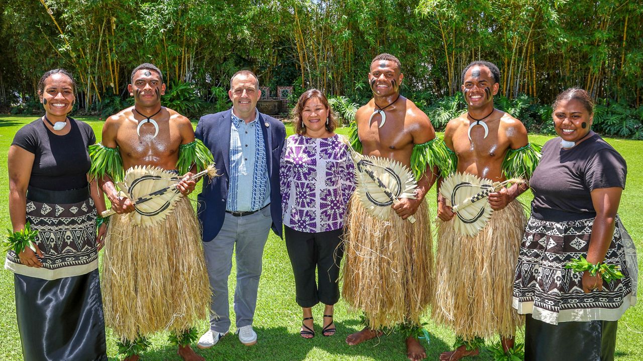 A photo from Tuesday's news conference with Gov. Josh Green, First Lady Jaime Kanani Green, and BYU-Hawaii dancers representing Fiji. (Photo courtesy of Office of the Governor)