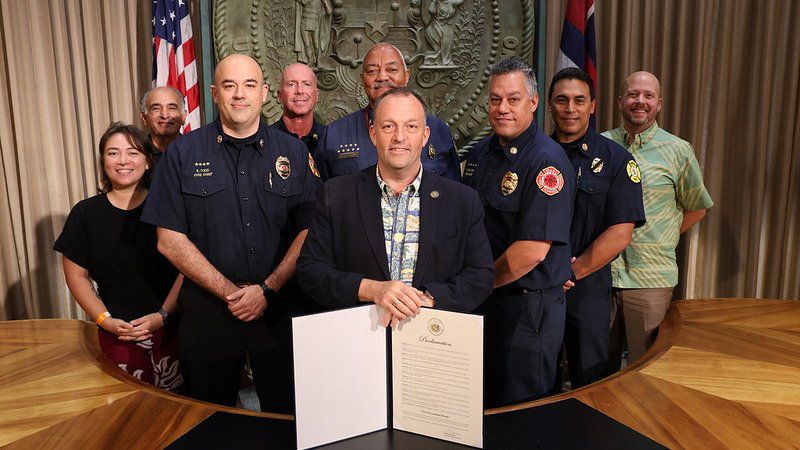 Gov. Josh Green together with fire chiefs from all counties and others signed the proclamation for Fire Prevention Week on Monday. (Courtesy Office of the Governor)