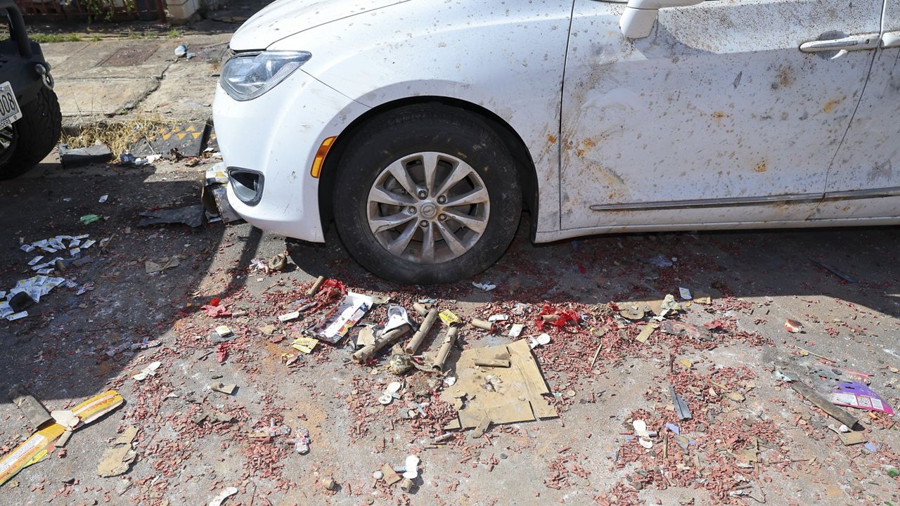 Debris is seen near the home where a New Year's Eve fireworks explosion killed and injured people, Wednesday, Jan. 1, 2025, in Salt Lake. (AP Photo/Marco Garcia)