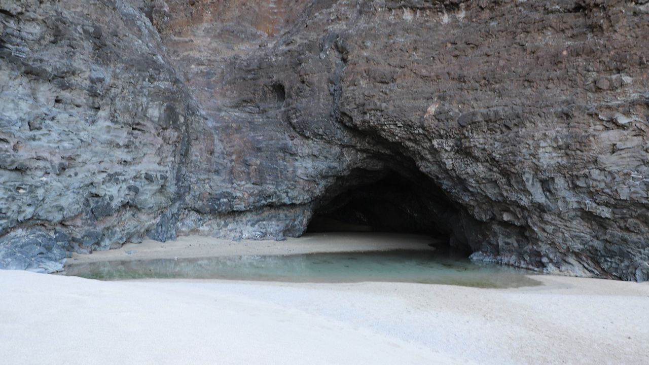 The Centers for Disease Control conducted water testing that showed evidence of fecal contamination inside the sea cave next to the Kalalau camping area. (Courtesy of Hawaii Department of Land & Natural Resources)