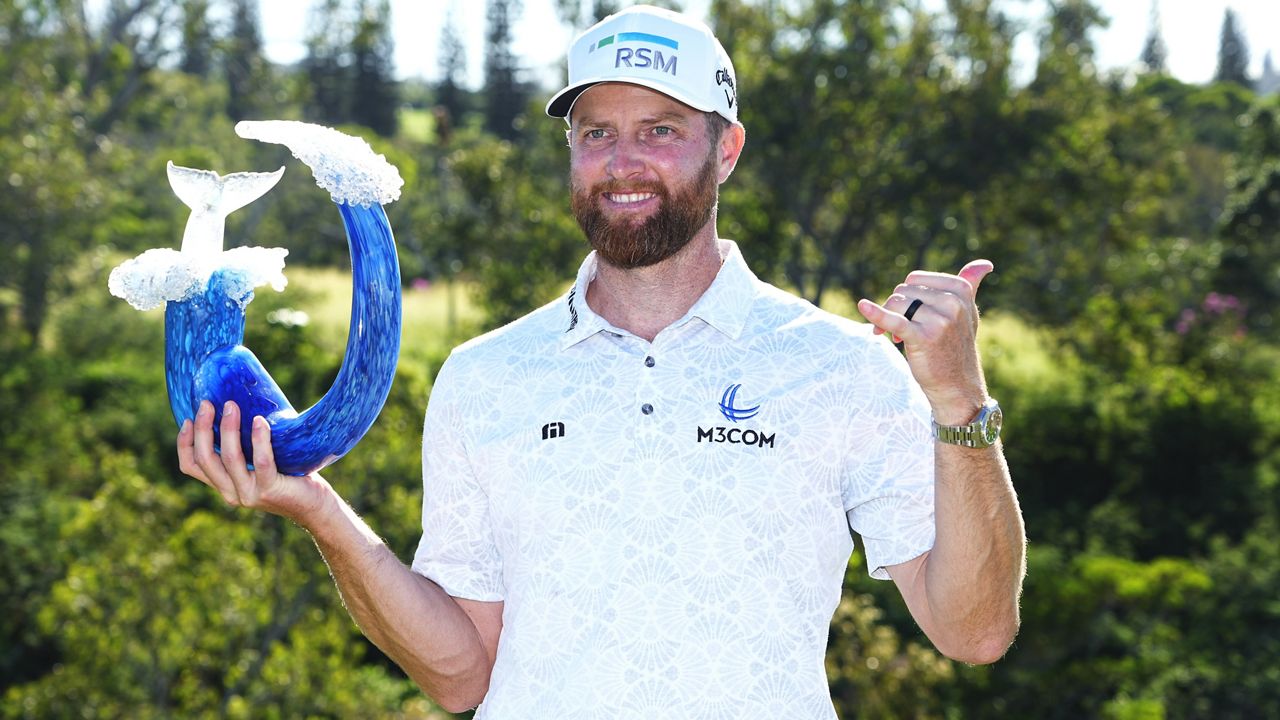 Chris Kirk held The Sentry champions trophy after winning by a stroke after Sunday's final round at Kapalua's Plantation Course. 