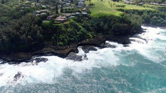 The rocky shoreline at Queen's Bath can be treacherous during the winter season. (Courtesy County of Kauai)