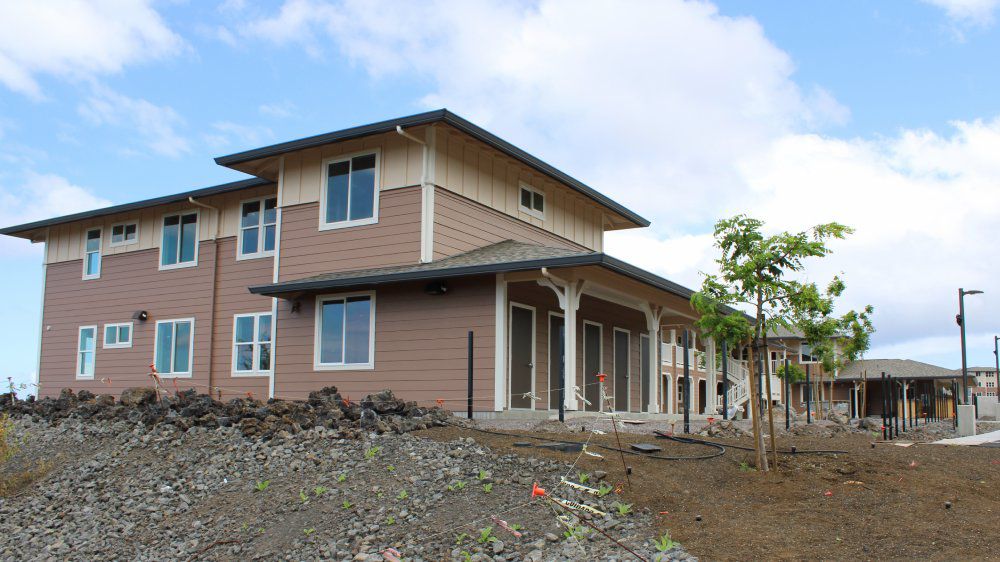 Six two-story and three-story garden-style wood-frame buildings will house the 99 units. (Photo courtesy of County of Hawaii)