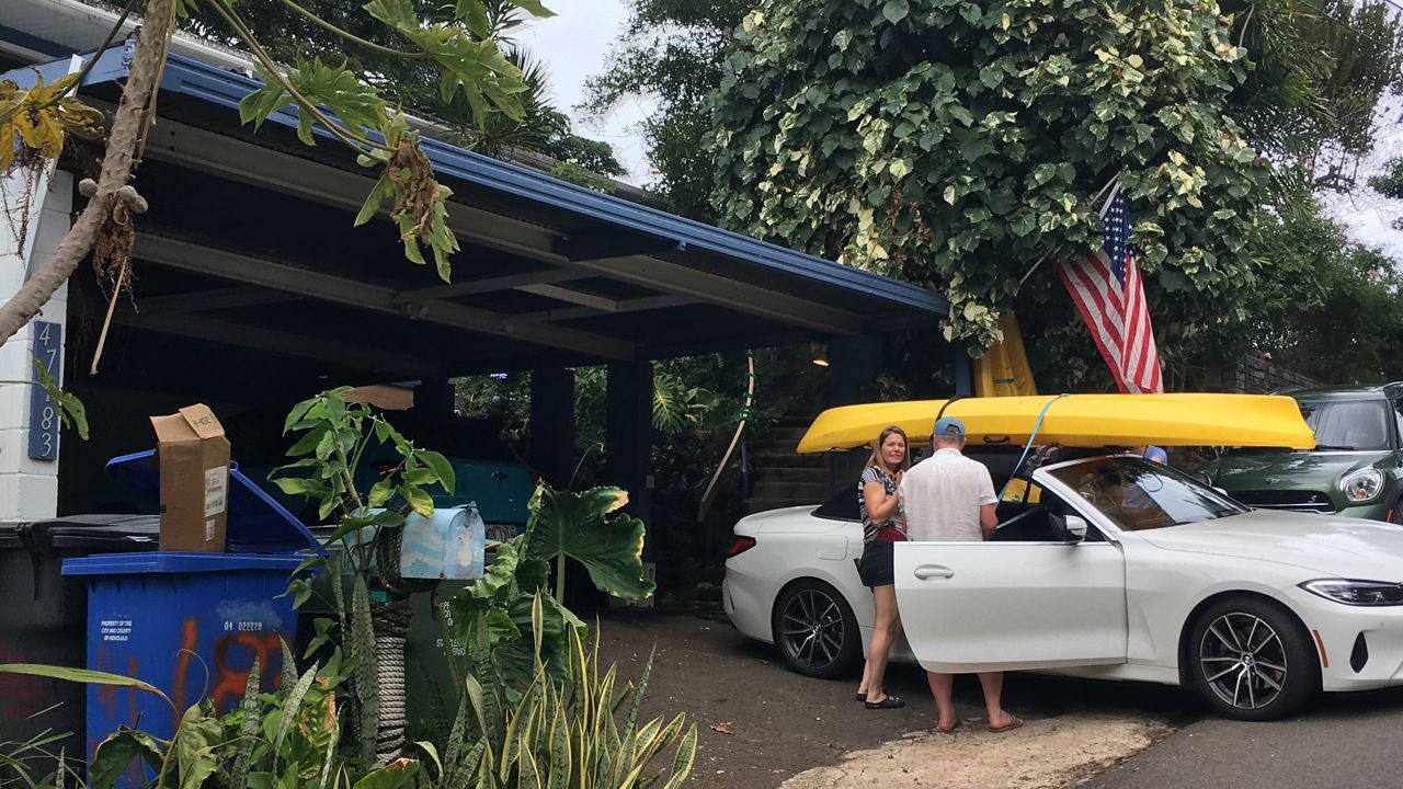 Janell Jensen operating her business from her home garage. (Photo courtesy of DLNR)