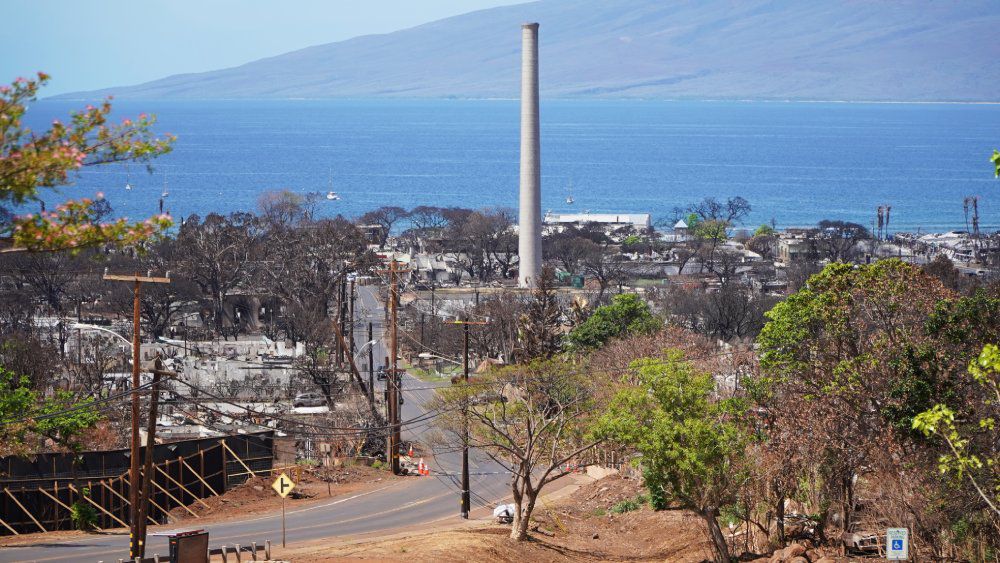 The Pioneer Mill Company’s 225-foot-high smokestack was built in 1928 and is a historic landmark. It’s seen here in Sept. 2023, just one of a handful of surviving structures after the August Lahaina wildfire. (Spectrum News/Sarah Yamanaka)
