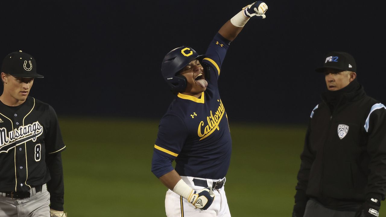 Ewa Beach native Caleb Lomavita celebrated after hitting a double against Cal Poly in the 2023 season.