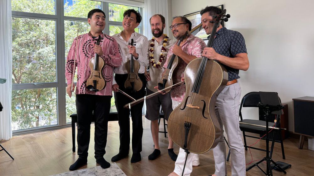 Pictured at left, violinist Eric Silberger of Mana Music Quartet; center, Tim Duerinck, who created the instruments; second from right, violist Duane Padilla, and at right, cellist Joshua Nakazawa, both of Mana Music Quartet. (courtesy Mana Music Hawaii)