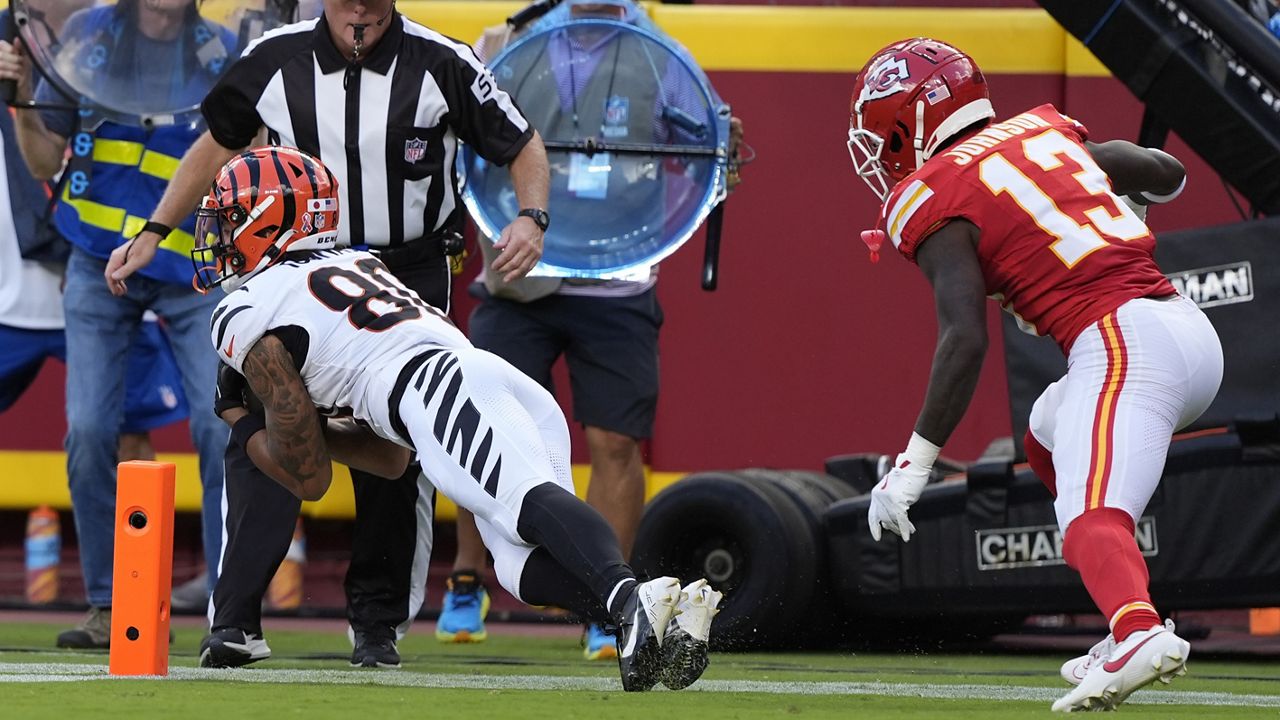 Cincinnati wide receiver Andrei Iosivas, left, got his toes down for a touchdown pass from Joe Burrow in front of Kansas City safety Nazeeh Johnson in Sunday's 26-25 loss to the Chiefs on Sunday.