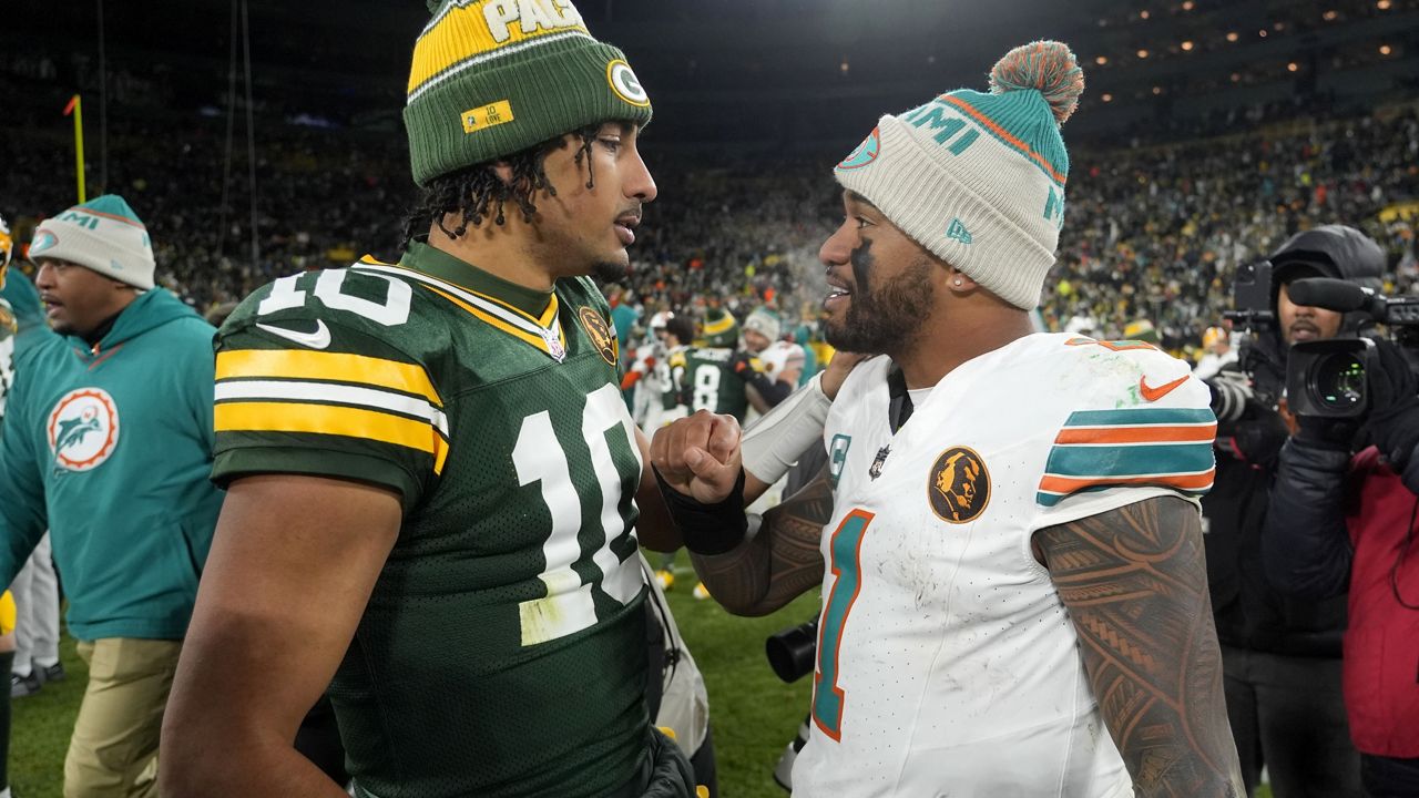 Green Bay Packers quarterback Jordan Love, left, spoke with Miami Dolphins quarterback Tua Tagovailoa after Green Bay's victory in Green Bay, Wis., on Thursday. 