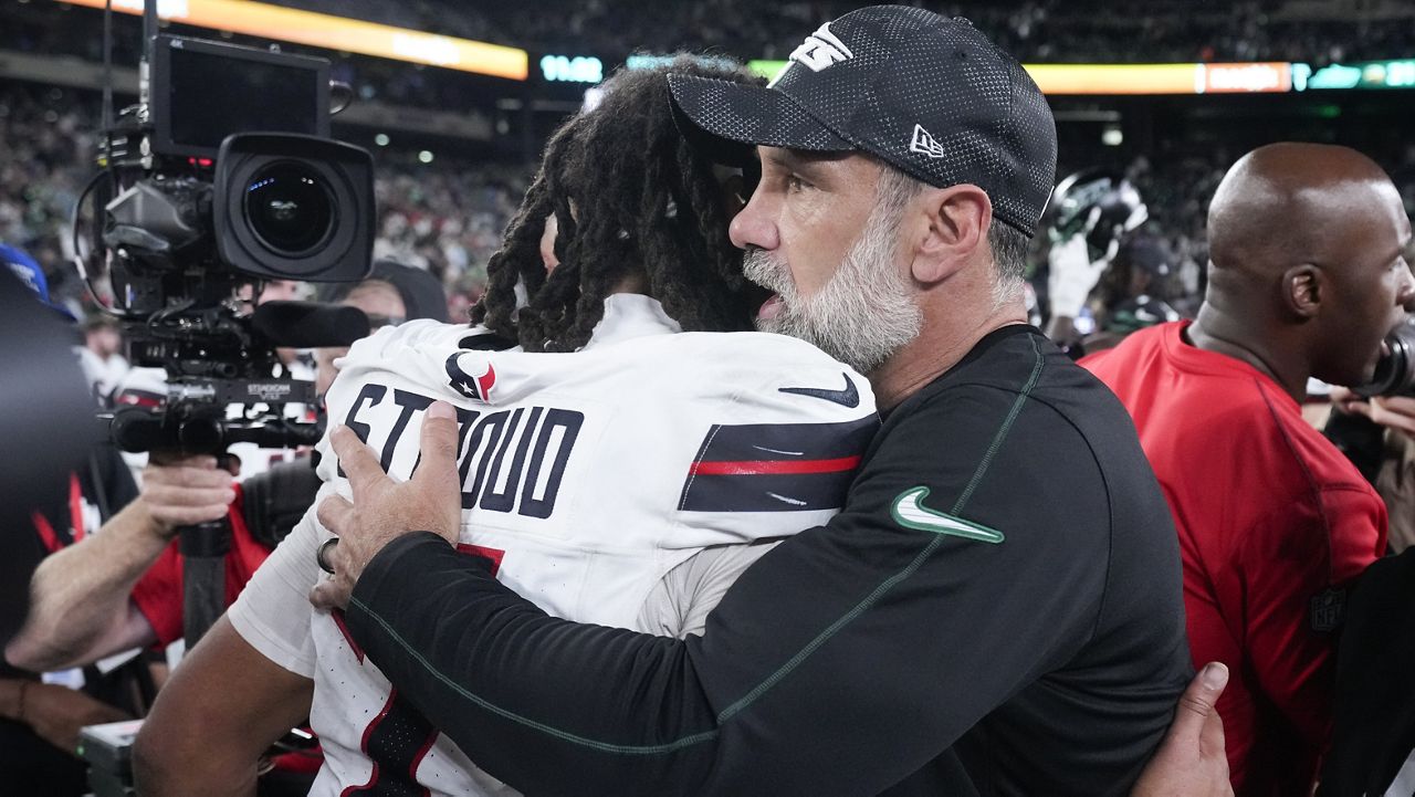 Houston Texans quarterback C.J. Stroud hugged New York Jets head coach Jeff Ulbrich after the Jets gave Ulbrich his first career win in East Rutherford, N.J., on Thursday night.