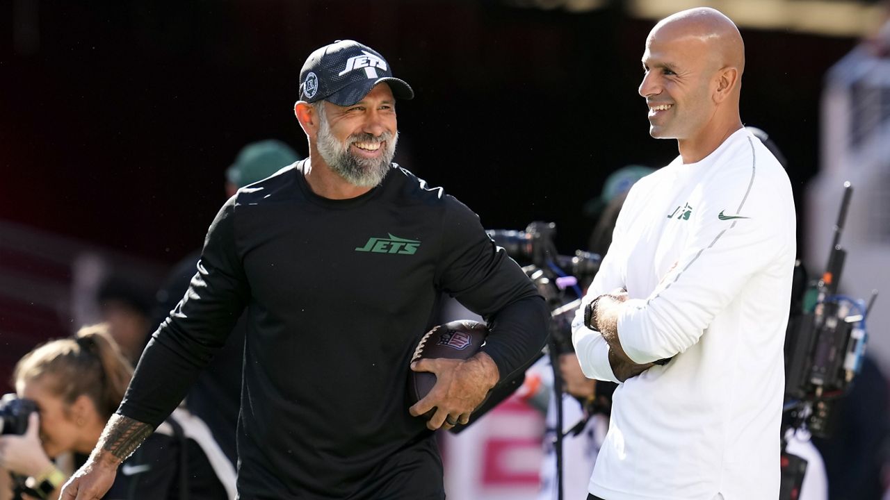 Robert Saleh, right, talked with Jeff Ulbrich before a game against the San Francisco 49ers in Santa Clara, Calif., on Sept. 9. Saleh was fired as New York Jets head coach on Tuesday and Ulbrich, a University of Hawaii alumnus and the Jets defensive coordinator, was elevated to interim head coach. (AP Photo/Godofredo A. Vásquez)