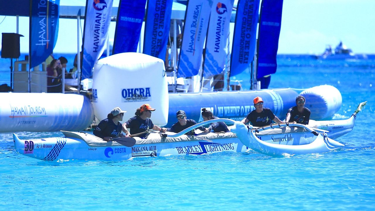 Team Bradley paddlers clasped hands as they crossed the Na Wahine O Ke Kai finish buoy in Waikiki with a winning time of 5 hours, 44 minutes and 52 seconds to cover the 41-mile journey across the Ka‘iwi Channel.