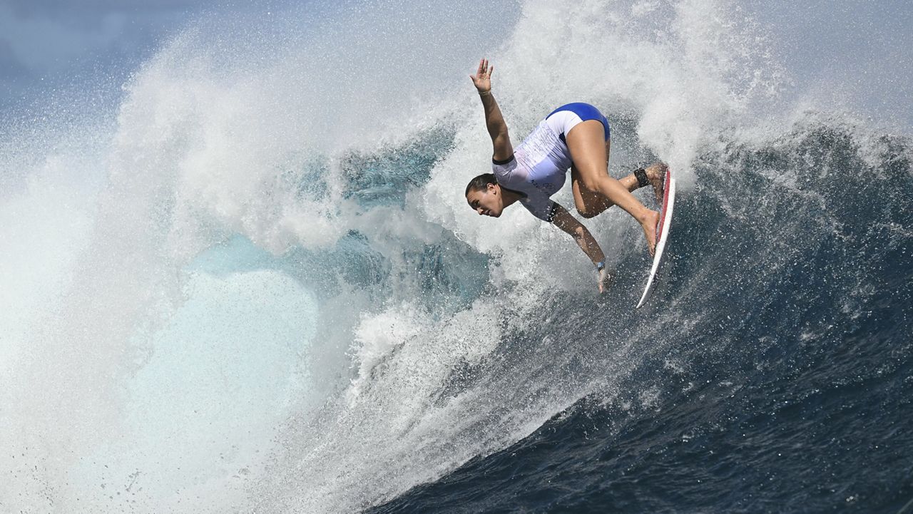 Hawaii's Carissa Moore got in a practice session at Teahupo'o off the French Polynesian Island of Tahiti on Monday, ahead of the Paris games. (Pool Photo via AP/Jerome Brouillet/)