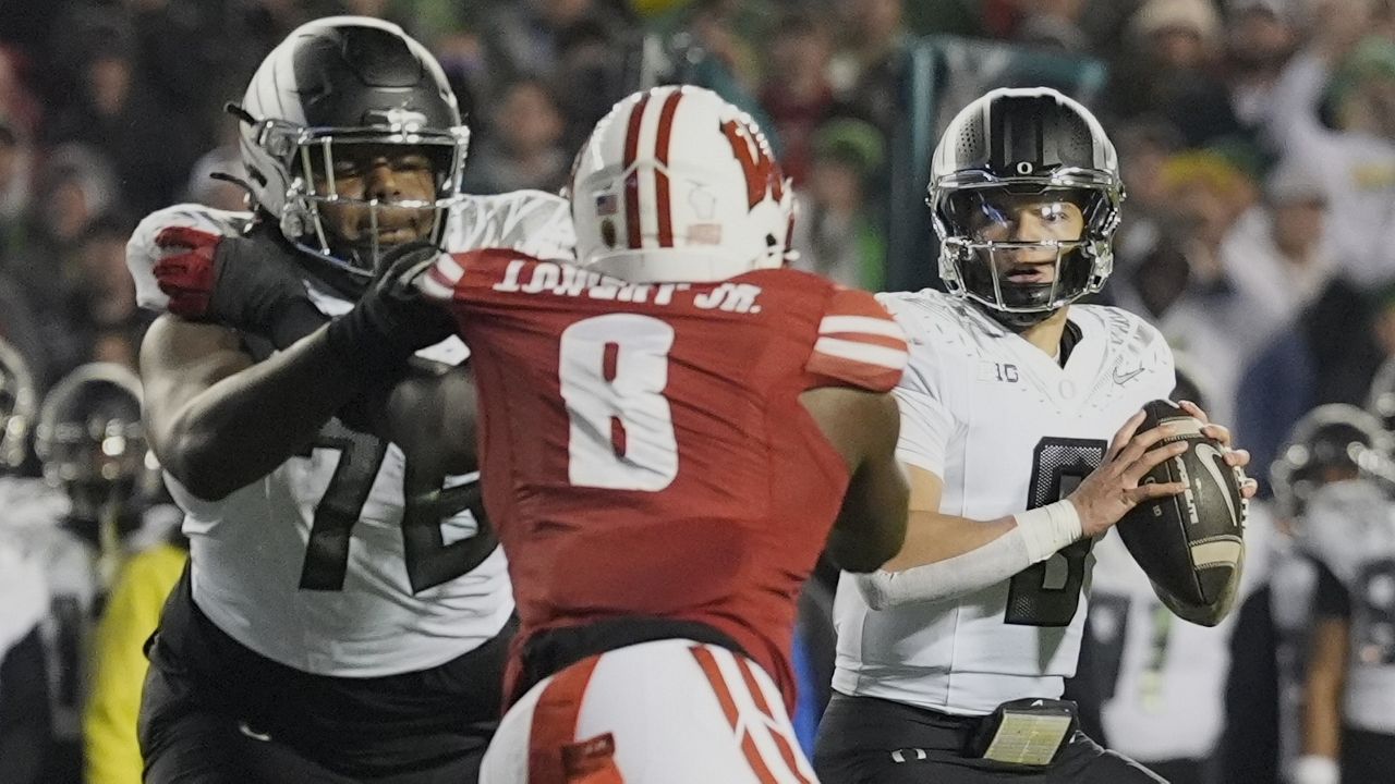 Oregon's Dillon Gabriel looked to throw in the second half against Wisconsin in Madison, Wis., on Saturday.