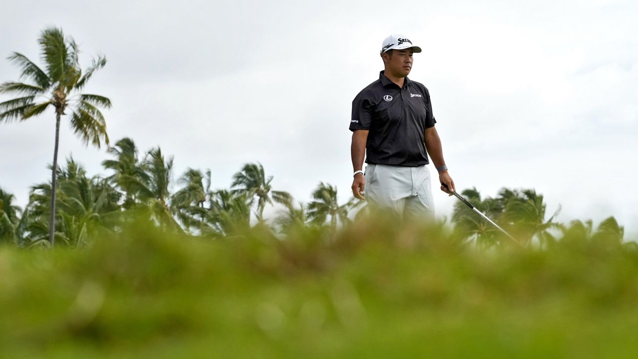 Hideki Matsuyama watched his shot on the 17th green during the pro-am round of the Sony Open at Waialae Country Club on Wednesday. Matsuyama will attempt to become the third person to win the "Hawaii swing" at Kapalua at Waialae in a single season.