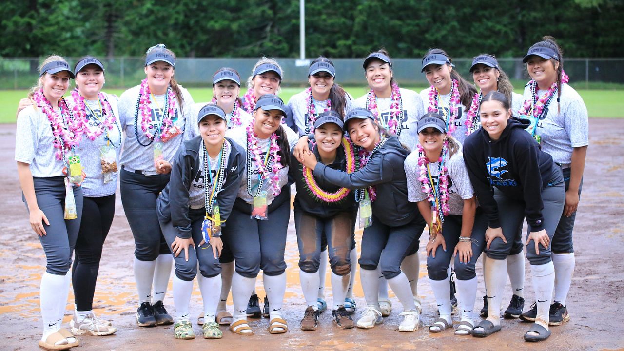 The Hawaii Pacific University softball team gathered on Howard A. Okita Field for one last team picture after the last scheduled games at the venue, a doubleheader against Chaminade, were rained out.