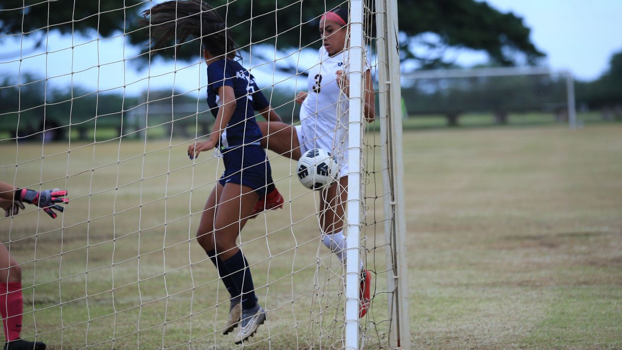 Punahou forward Xehlia Salanoa (3) put home a rebounded ball for a goal at the back post in the Buffanblu's 4-0 win over Kamehameha for the ILH Division I girls soccer title on Wednesday.