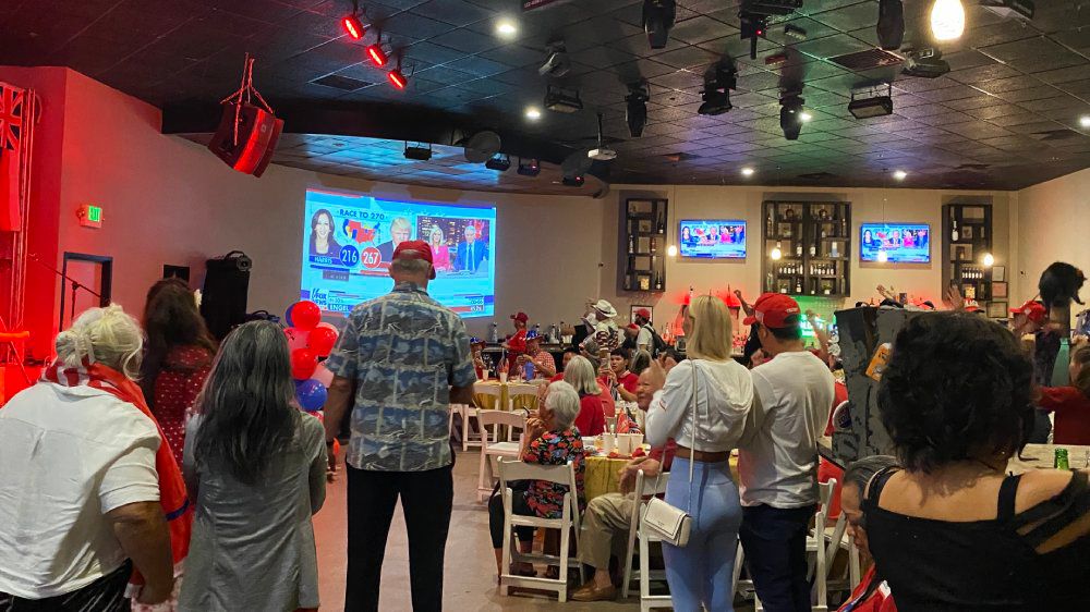 All eyes were on the news throughout the night as Trump supporters ultimately ended up celebrating before departing the watch party. (Spectrum News/Sarah Yamanaka)