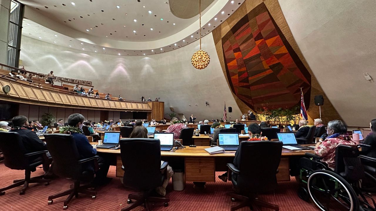 Lawmakers deliberate in the Hawaii House of Representatives at the Hawaii State Capitol on Friday, May 3, 2024, the last day of the legislative session. Hawaii lawmakers on Friday wrapped up a legislative session heavily focused on addressing Maui's needs after last year's deadly Lahaina wildfire. (AP Photo/Audrey McAvoy)