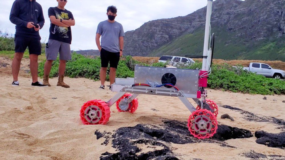 Team RoSE in the field testing their robotic rover for a possible mission to Mars. (Photo courtesy of the University of Hawaii at Manoa)