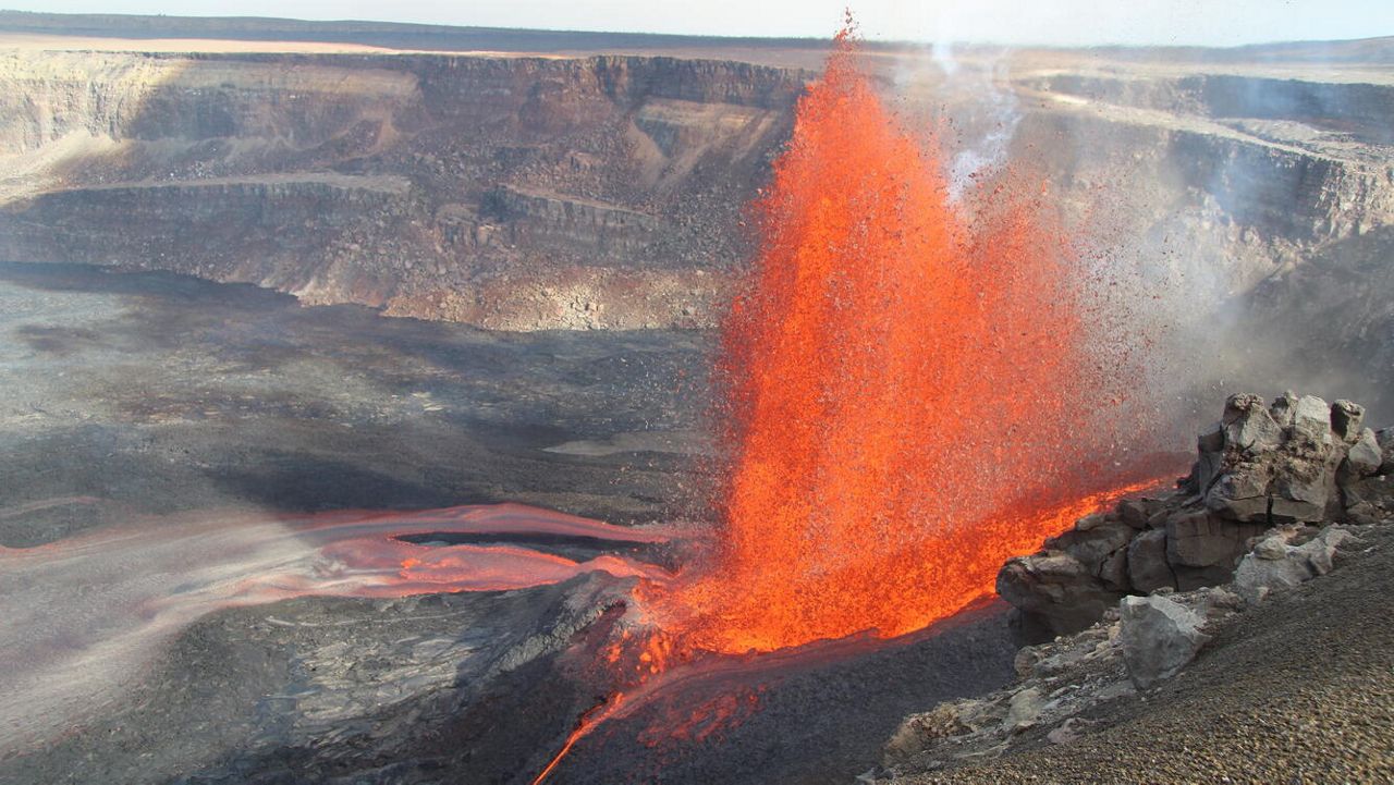 On May 11, the Hawaiian Volcano Observatory scientists visited the western rim of Halemaʻumaʻu crater to observe episode 21 of the ongoing Kilauea summit eruption. While there, they captured this photo of lava fountains that were reaching approximately 500 feet in height above the north vent and feeding several open lava channels onto the crater floor. (Photo courtesy of USGS, by M. Zoeller)