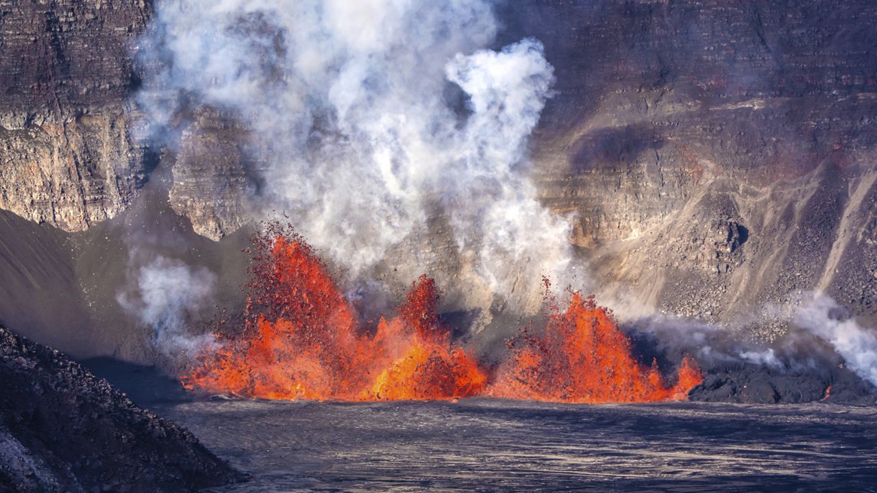 This photo shows the first of two eruptive episodes at Kilauea, which started Monday. (Janice Wei/NPS via AP)